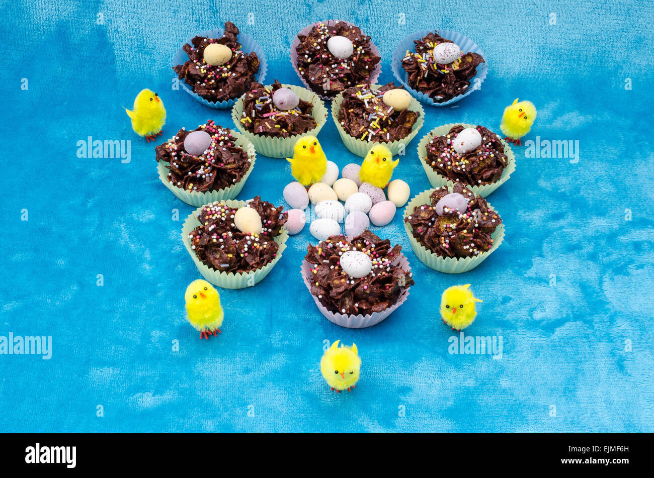 Collection of mini chocolate Easter eggs, cornflake cakes and baby