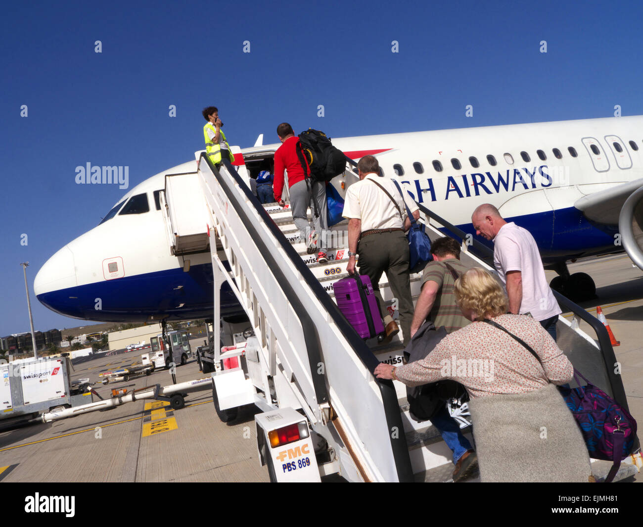 BRITISH AIRWAYS STEPS PASSENGERS boarding a British Airways aircraft