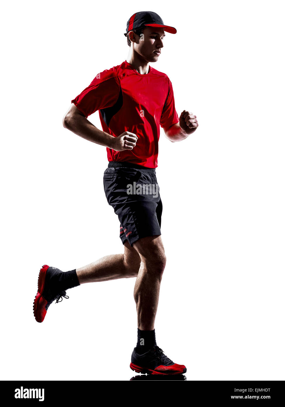 one young man runner jogger running jogging in silhouette isolated on