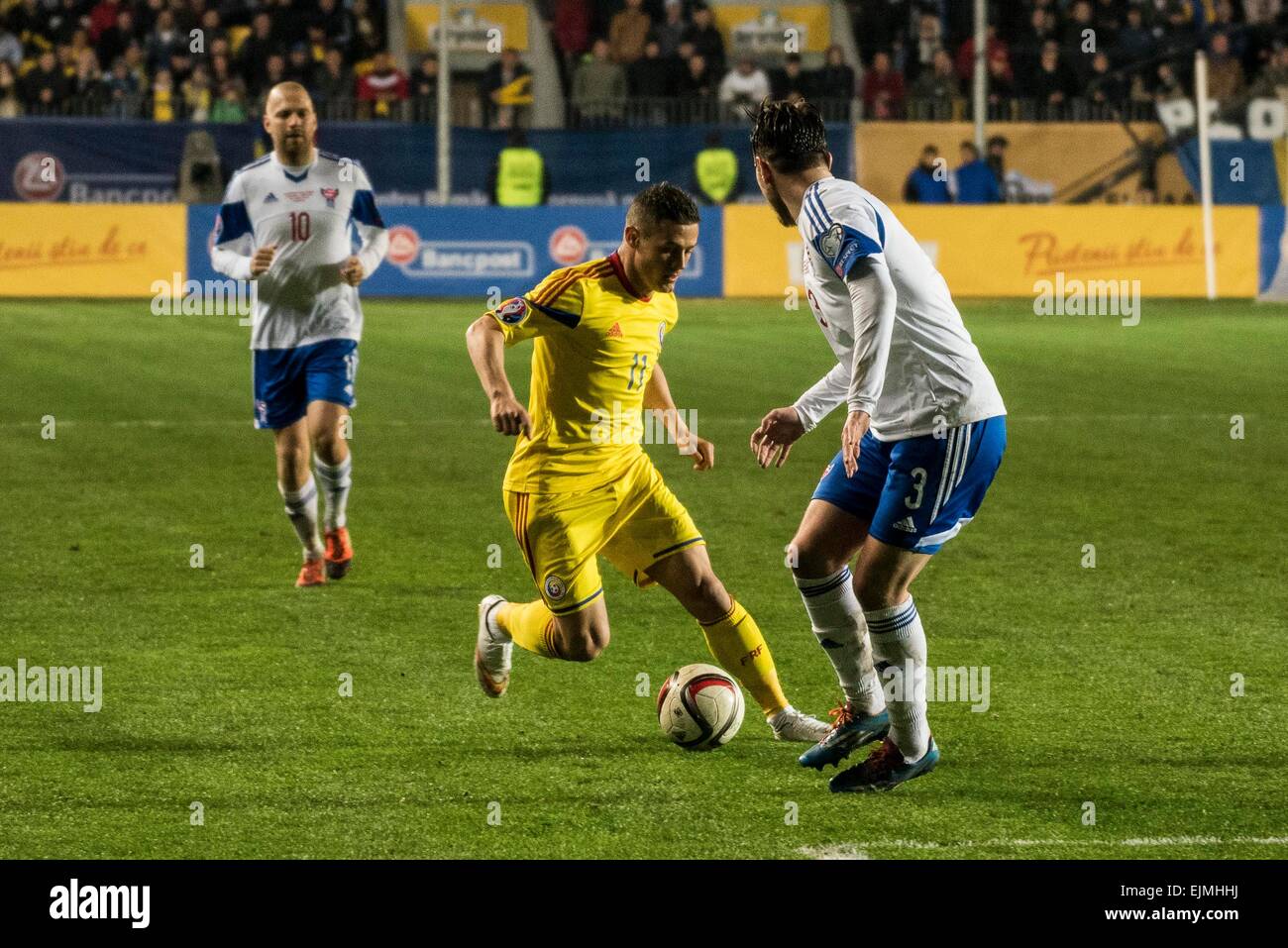 March 29, 2015: Viljormur Davidsen #3 of Faroe Islands National Team and Gabriel Torje #11 of Romania National Team in action during the 15th UEFA European Championship Qualifying Round game between Romania National Football Team (ROU) and Faroe Islands National Football Team (FRO) at ''Ilie Oana'' Stadium, Ploiesti in Ploiesti, Romania ROU. Catalin Soare/www.sportaction.ro Stock Photo