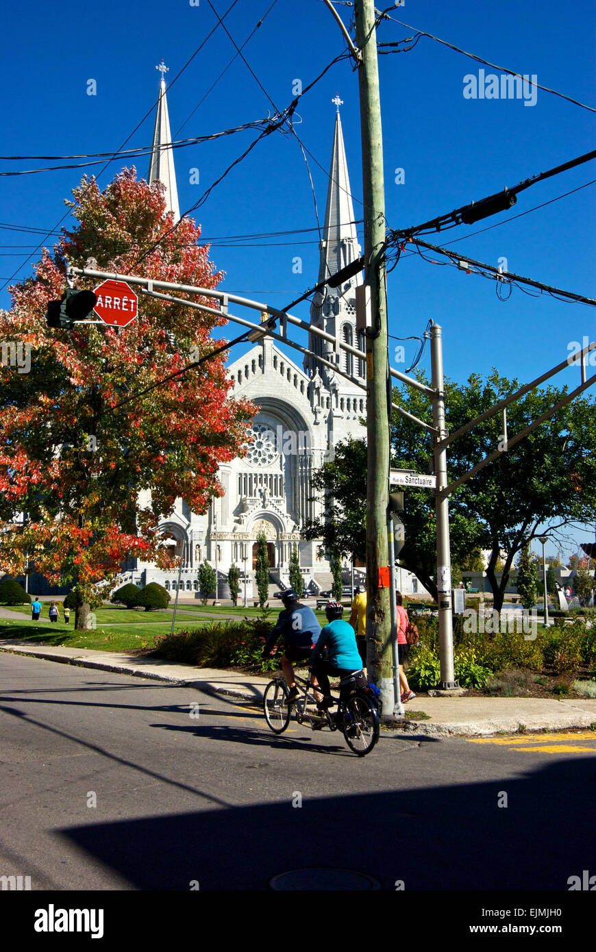 Cyclists tandem bicycle Sainte Anne de Beaupre Basilica Stock Photo