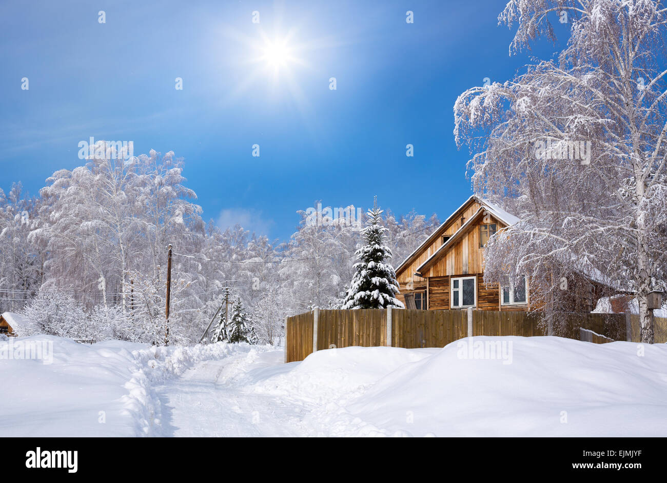 Wooden Siberian house in winter snow Stock Photo Alamy