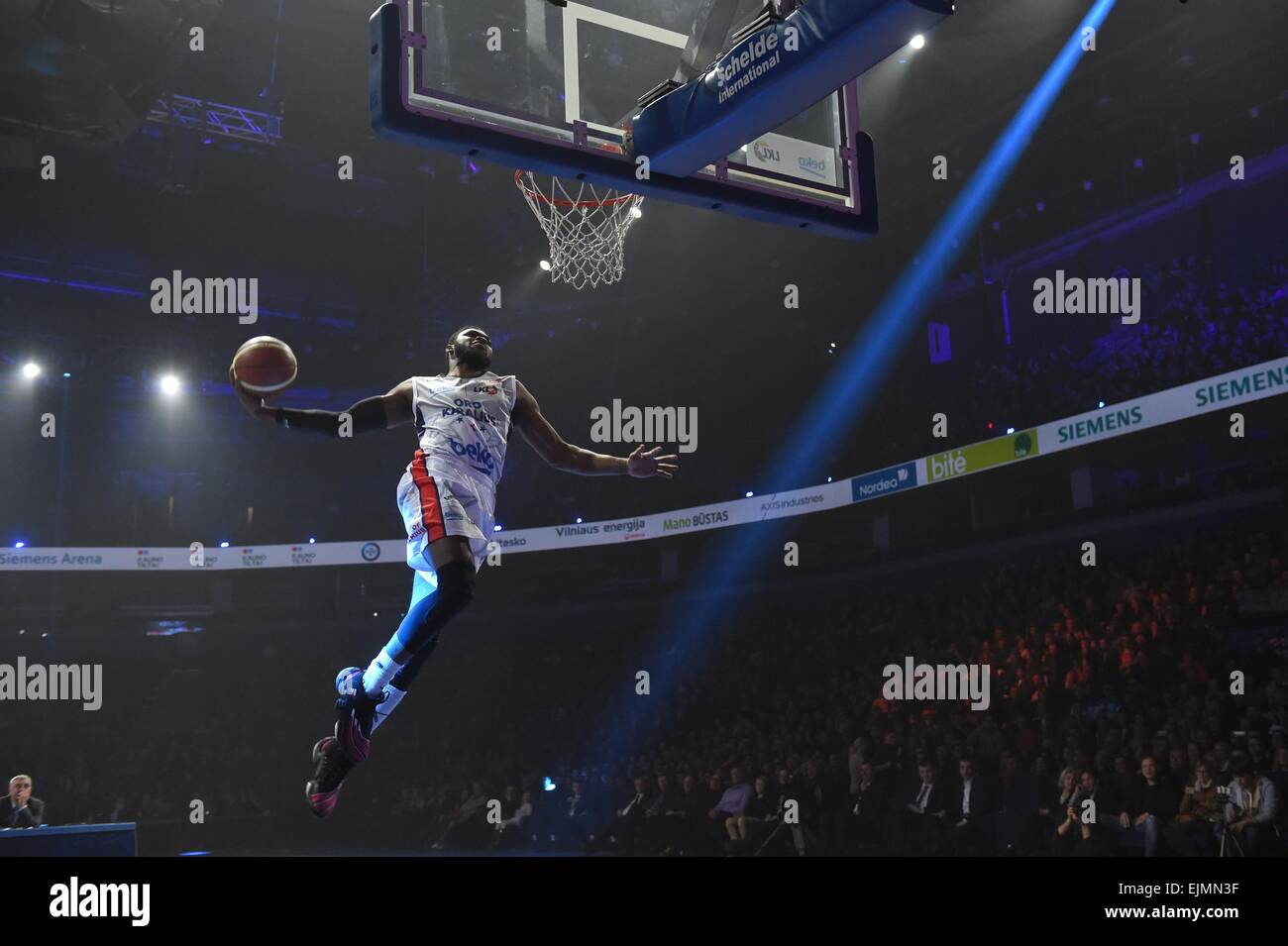 Vilnius, Lithuania. 29th Mar, 2015. Travis Leslie of the U.S. does slam dunk during the All Star game in Vilnius, Lithuania, on March 29, 2015. The Lithuanian Basketball League held an All Star game on Sunday. Travis Leslie won the MVP of the 2015 All Star game. Credit:  Alfredas Pliadis/Xinhua/Alamy Live News Stock Photo