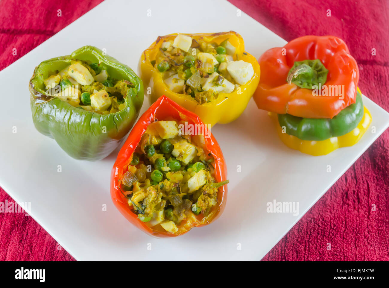 grilled bell pepper (capsicum ) stuffed with mashed potato ,tofu and peas Stock Photo Alamy