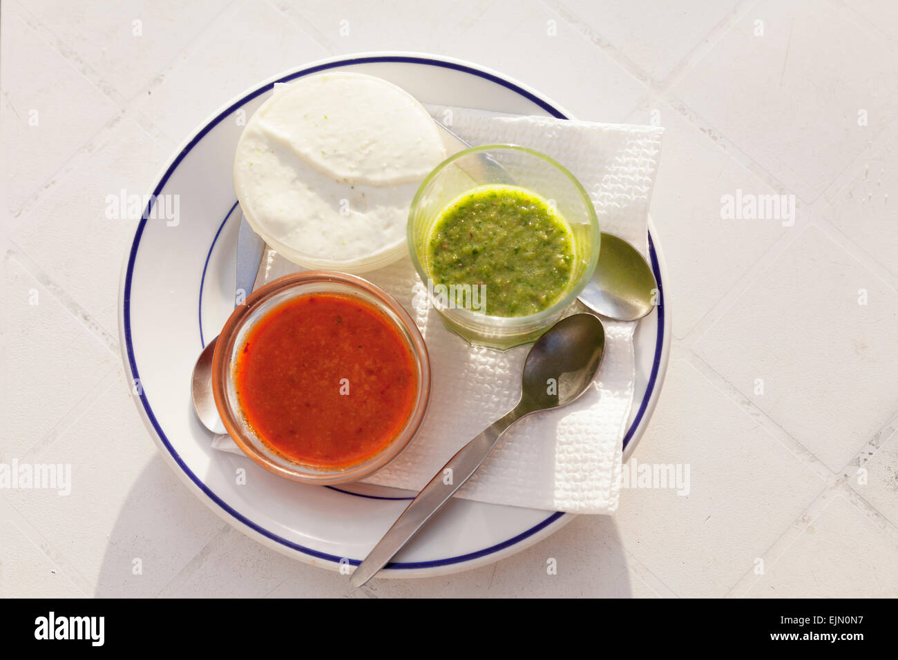 Mojo rojo, mojo verde, red and green sauce, and mojo de queso, white cream cheese, La Gomera, Canary Islands, Spain Stock Photo