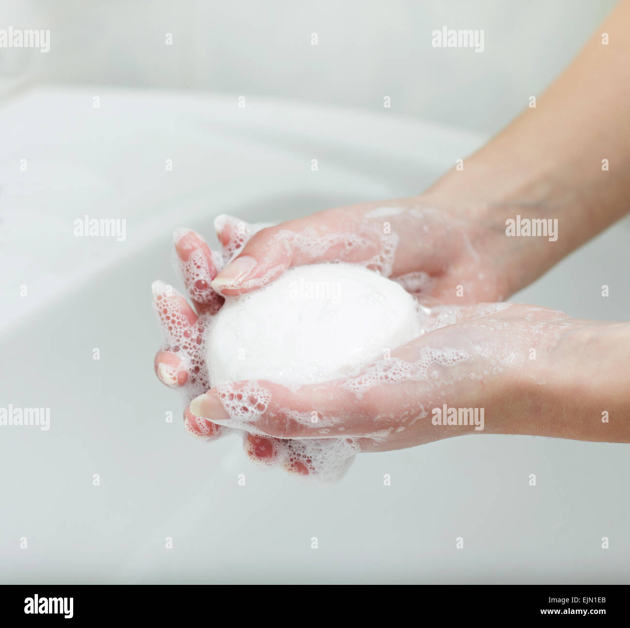 Washing Hands with soap in bathroom. Hygiene Stock Photo Alamy