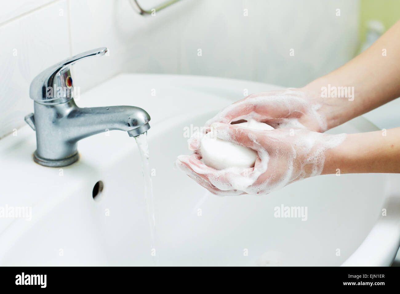 Washing Hands with soap in bathroom. Hygiene Stock Photo Alamy