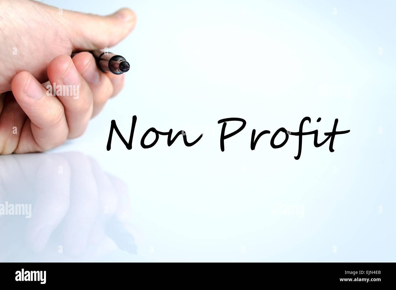Human hand writing Non Profit  isolated over white background - business concept Stock Photo