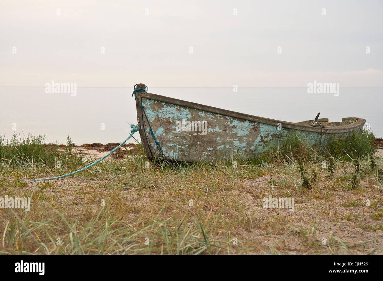 Old dinghy on a beach. Copy space Stock Photo Alamy