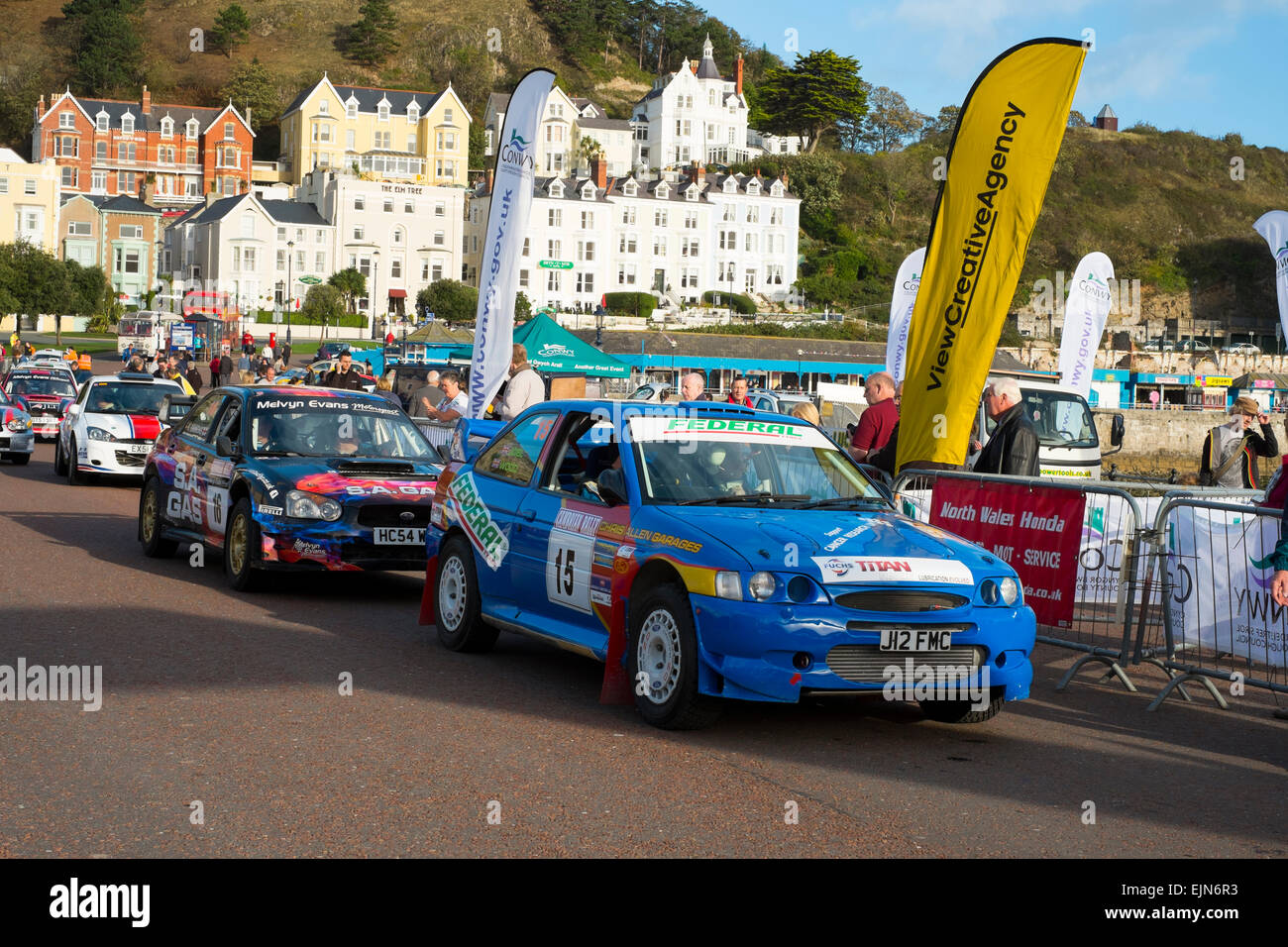 Rally cars on the seafront at Llandudno, Wales, at the start of the Cambrian Rally. Stock Photo
