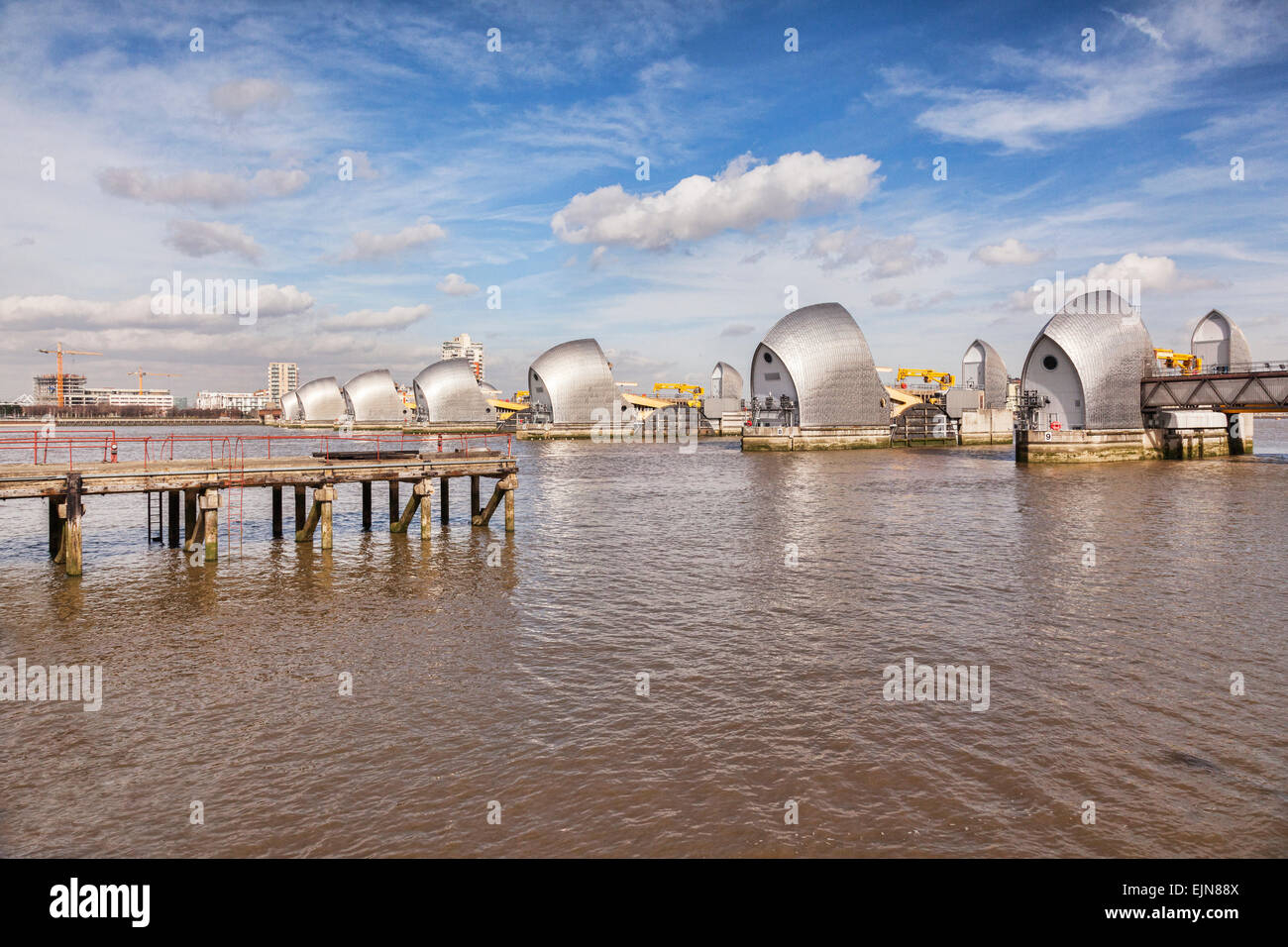 Thames Barrier, London, England, and an old jetty. Stock Photo