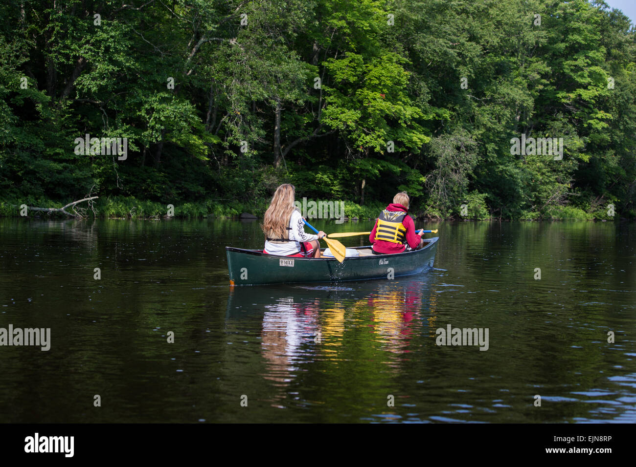 Mother and son paddling down the Flambeau River Stock Photo