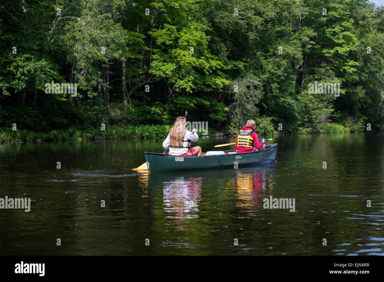 Mother and son paddling down the Flambeau River Stock Photo