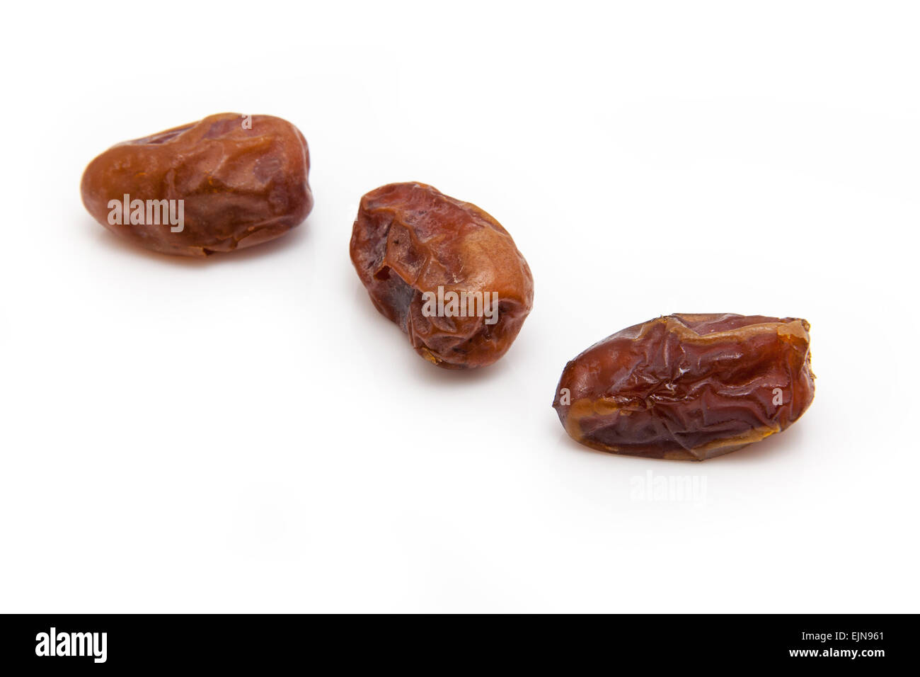 Halawi dates isolated on a white background. Halawi dates originate