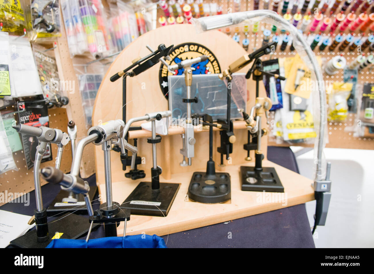 Fly tying vices on sale at a tackle shop. Stock Photo
