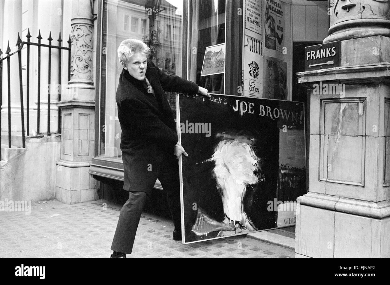 Singer Joe Brown collects a picture of himself from Portal Gallery, Grafton Street, W1. 5th July 1962. *** Local Caption *** watscan - - 05/03/2010 Stock Photo
