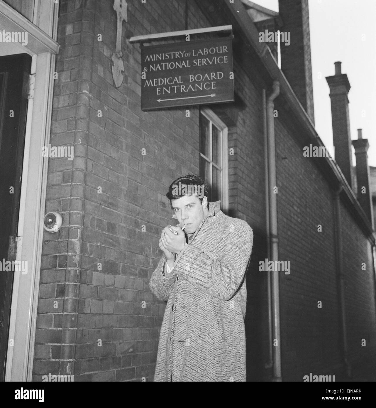 Marty Wilde, singer, pictured outside Army Recruiting Office ahead of his National Service Medical, 3rd February 1959. *** Local Caption *** Army Recruitment Centre Ministry of Labour and National Service Medical Board Entrance Stock Photo
