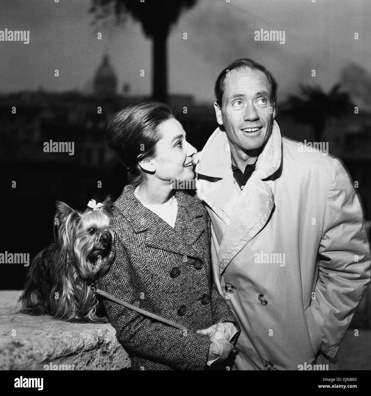Actress Audrey Hepburn pictured with her American film actor husband Mel Ferrer and their pet dog in Rome, Italy. 8th January 1960. Stock Photo