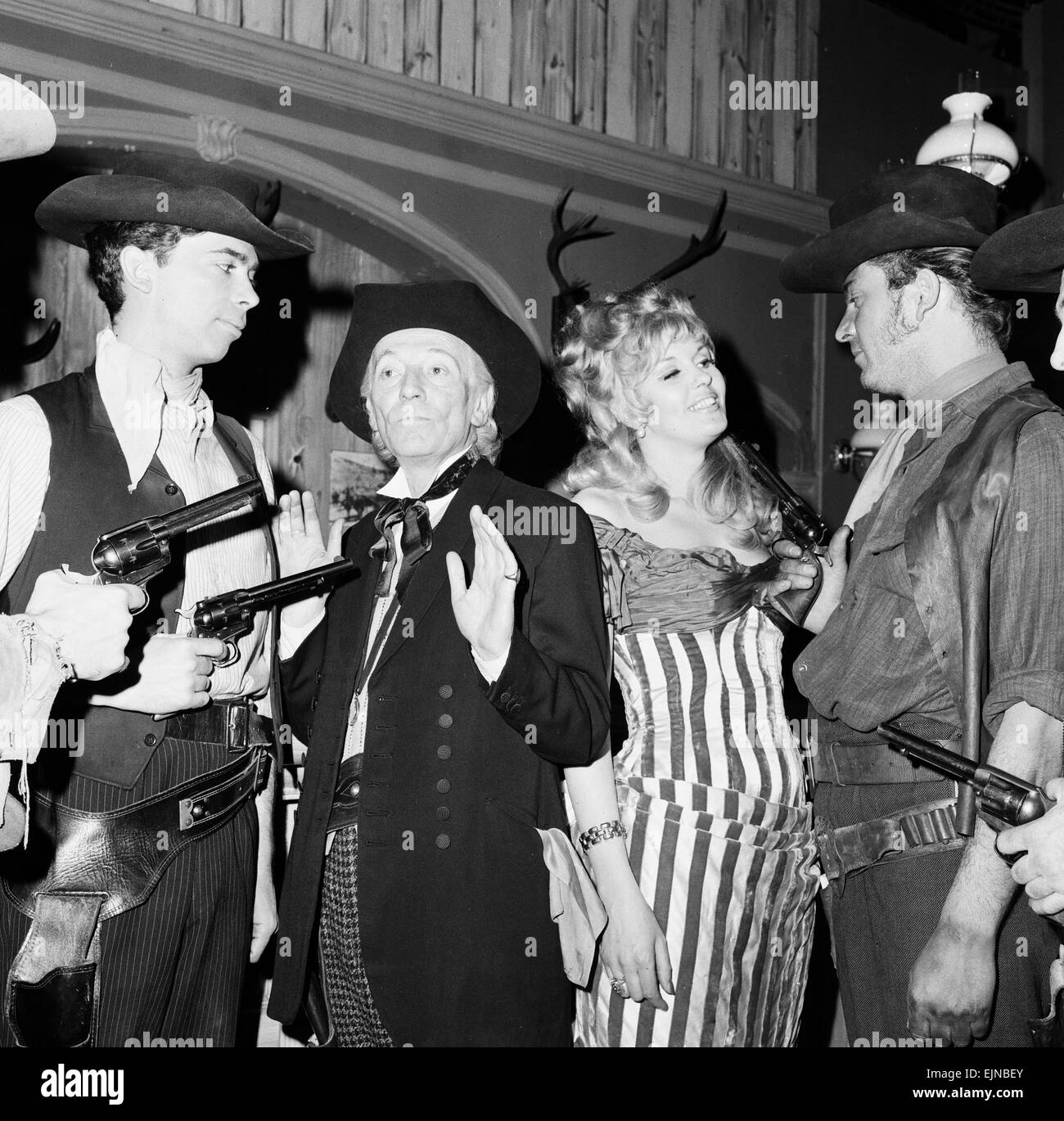 Actors rehearse for new Dr Who Story - The Gunfighters - at BBC Television Centre London 22nd April 1966. Pictured: William Hartnell - the first doctor & Sheena Marsh who plays Kate, pictured in a hold up scene in a Western Saloon Bar. *** Local Caption *** Dr WhoDr Who - - 13/08/2010 Stock Photo