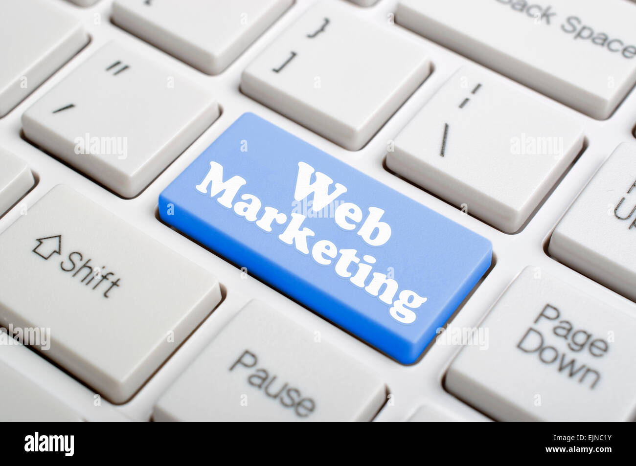 Blue web marketing key on keyboard Stock Photo