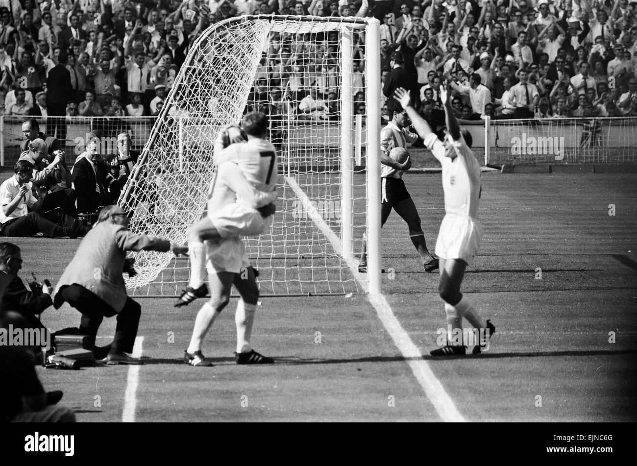 England v Argentina World Cup Quarter Final Wembley Stadium, London 23rd July 1966. England players celebrate Geoff Hurst's winner Final score: England 1-0 Argentina Argentina captain Antonio Rattin was sent off but refused to leave the field for ten minutes and sat down on the red carpet. After the match England manager Alf Ramsey was incensed by the style of play the Argentines used, labelling them "animals" and refusing to let his players swap shirts with them. *** Local Caption *** Geoff Hurst Stock Photo