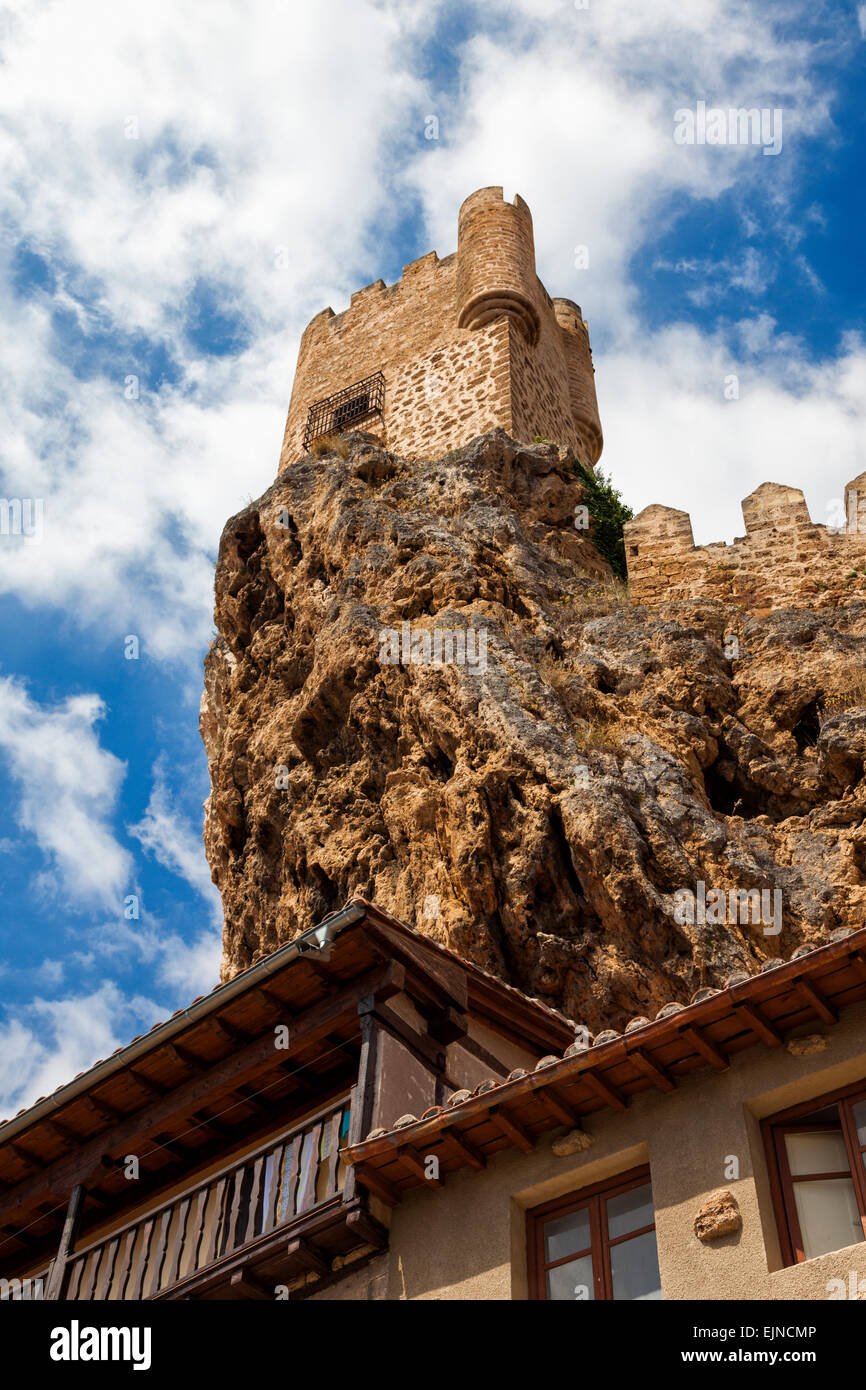 Medieval castle located at the top of a hill, over some houses; located at Frias, Burgos, Spain Stock Photo