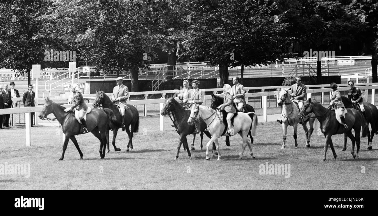 Members of the Royal Family including Queen Elizabeth, Prince Philip the Duke of Edinburgh, the Duckess of Kent, Prince Charles, the Duke of Kent, Princess and Margaret and Lord Snowdon gallop down to the course at Ascot. 20th June 1968. Stock Photo
