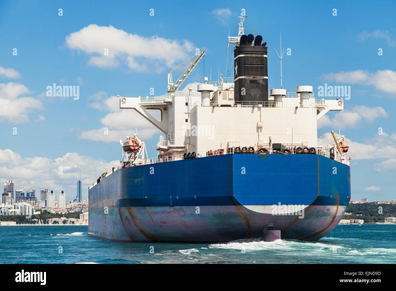Freighter crossing the Bosphorus strait in Istanbul, Turkey. Stock Photo
