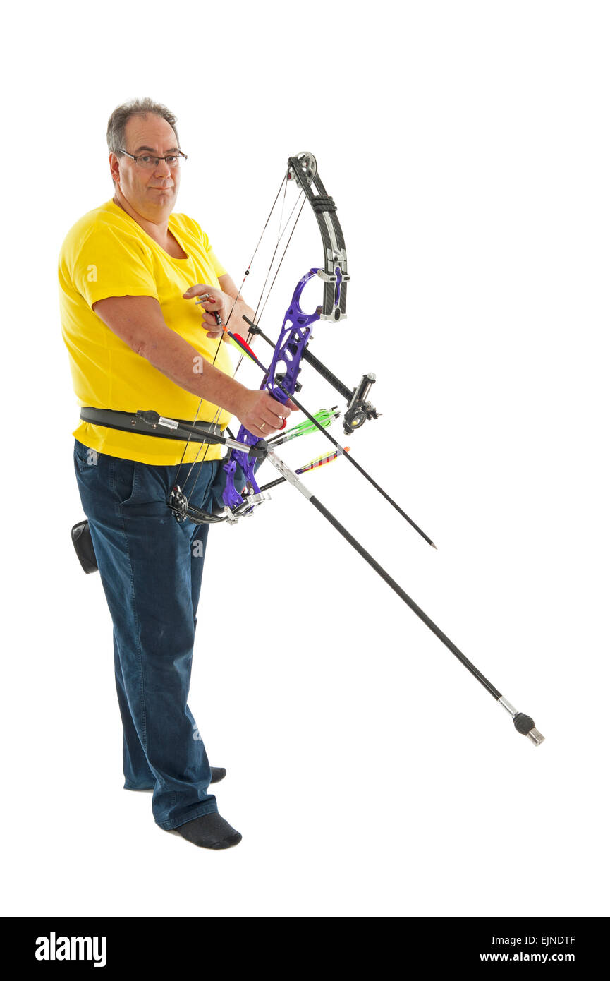 Man with yellow shirt and jeans holding a longbow isolated in white Stock Photo