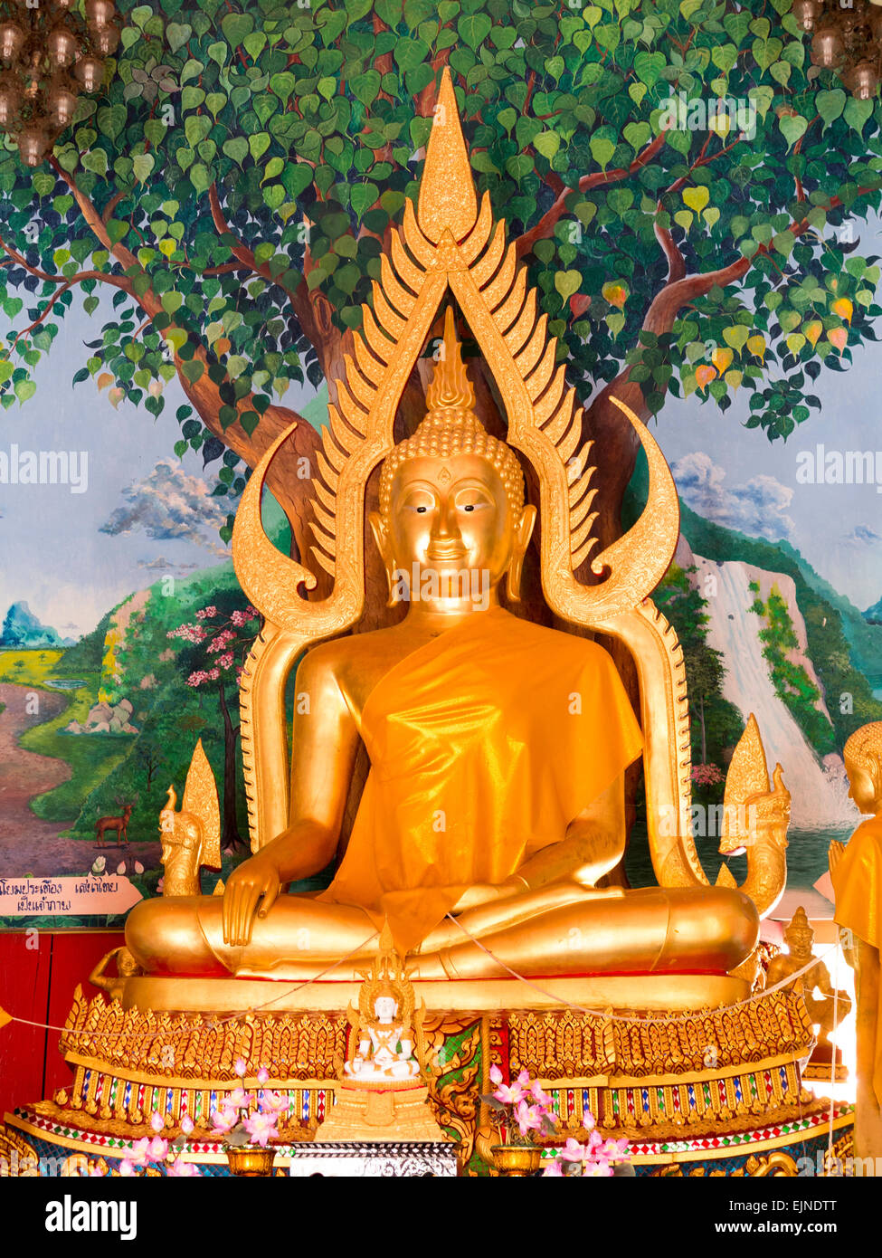 Golden statue of Buddha inside one of several Temples at Wat Plai Laem on Koh Samui Stock Photo