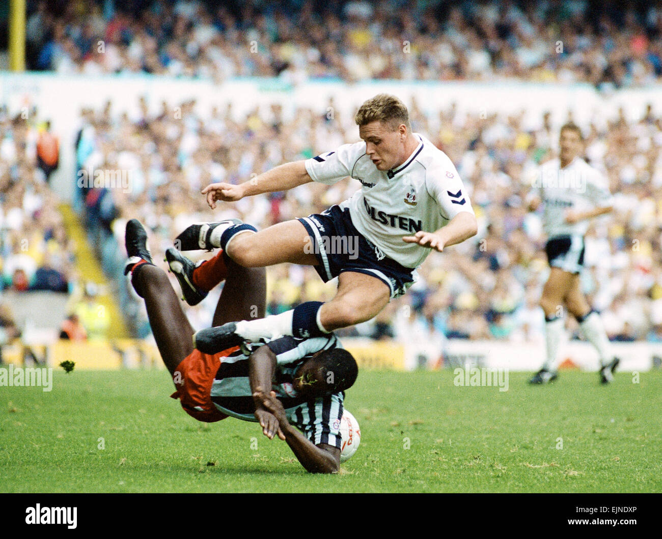 English League Division One match at White Hart Lane. Tottenham Hotspur 3 v Derby County 0. Paul Gascoigne of Spurs, who scored a hat-trick in the match, in a hard challenge for the ball. 8th September 1990. Stock Photo