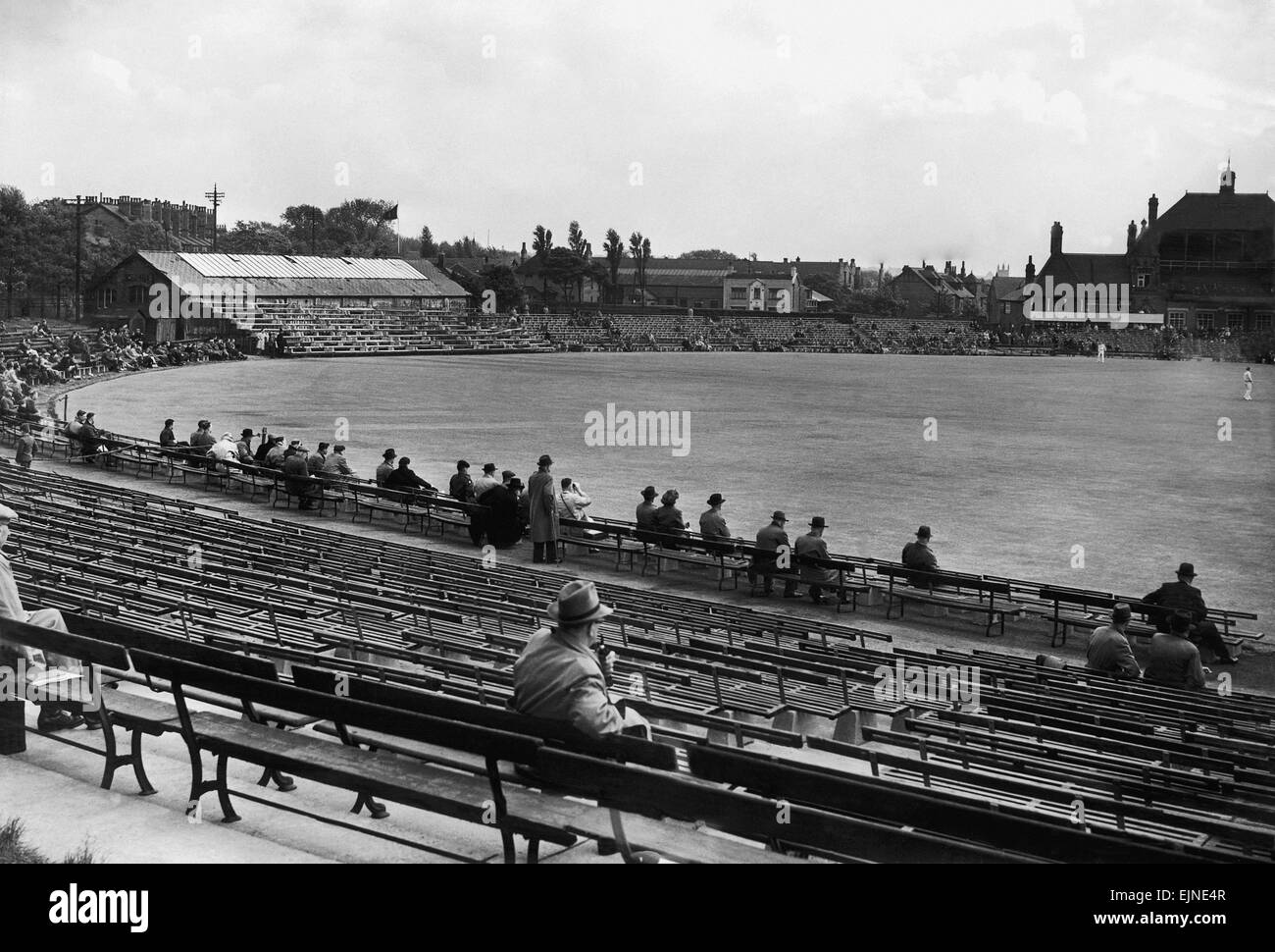 Spectators watching the action at Headingley, the ground of Yorkshire Cricket Club in Leeds.. c.1935 Stock Photo