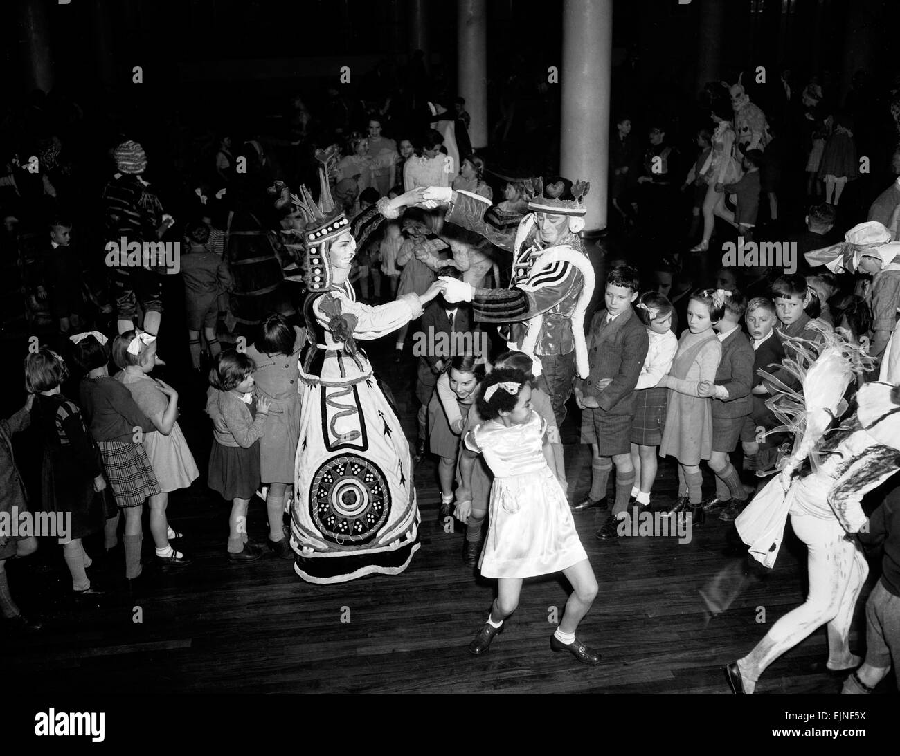 Mad Hatter's tea party. 22nd December 1953. *** Local Caption *** watscan - - 27/05/2010 Stock Photo