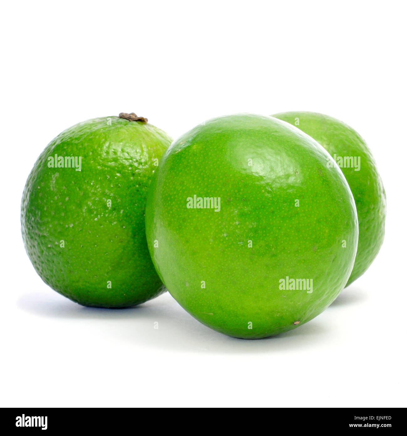 a pile of limes on a white background Stock Photo