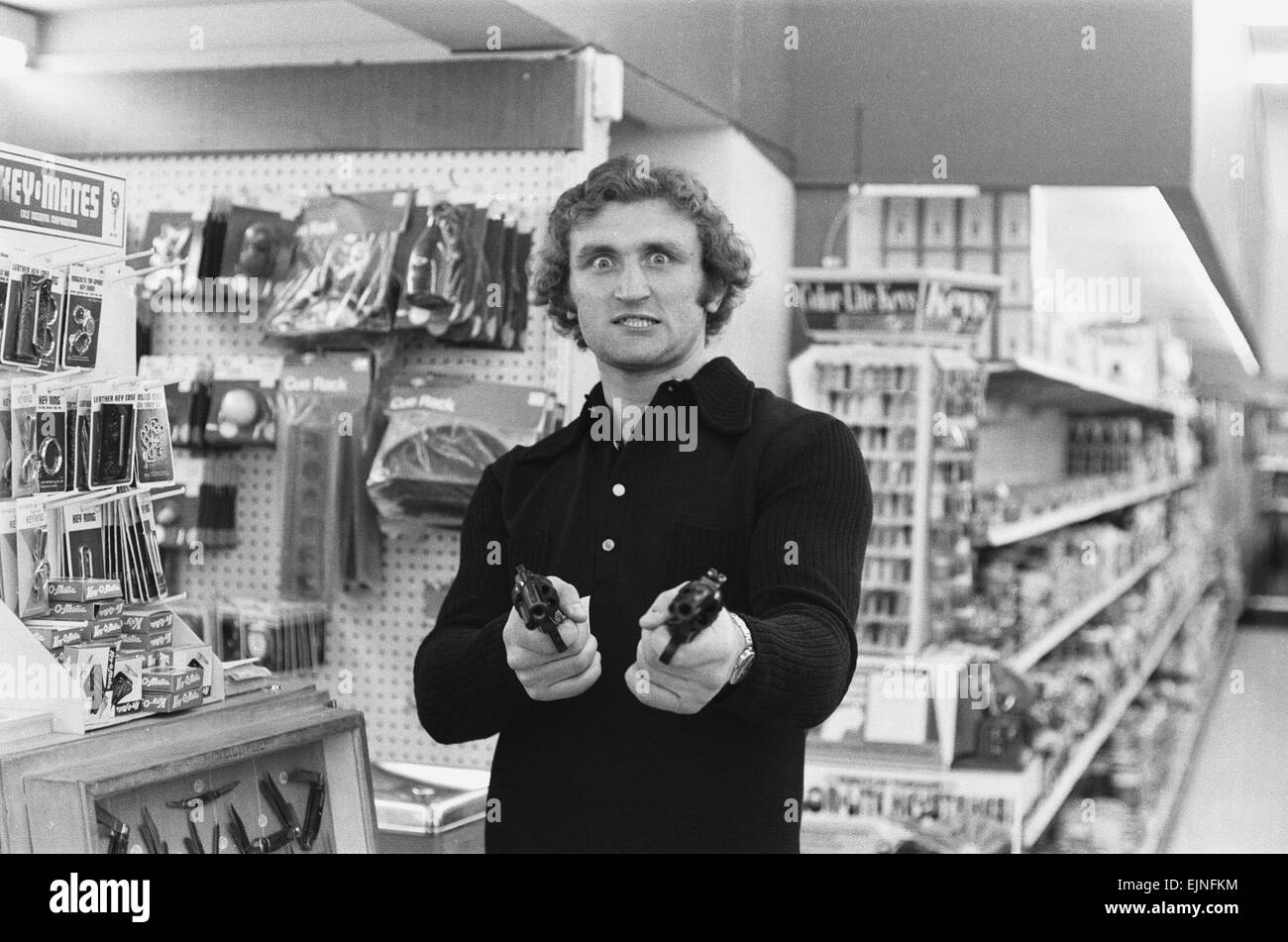 British Heavyweight Champion Joe Bugner seen here in a Las Vegas supermarket posing with a pair of had guns. Bugner is in Las Vegas for his fight against Muhammad Ali. Bugner is looking for his tenth straight win. 13th December 1972 Stock Photo
