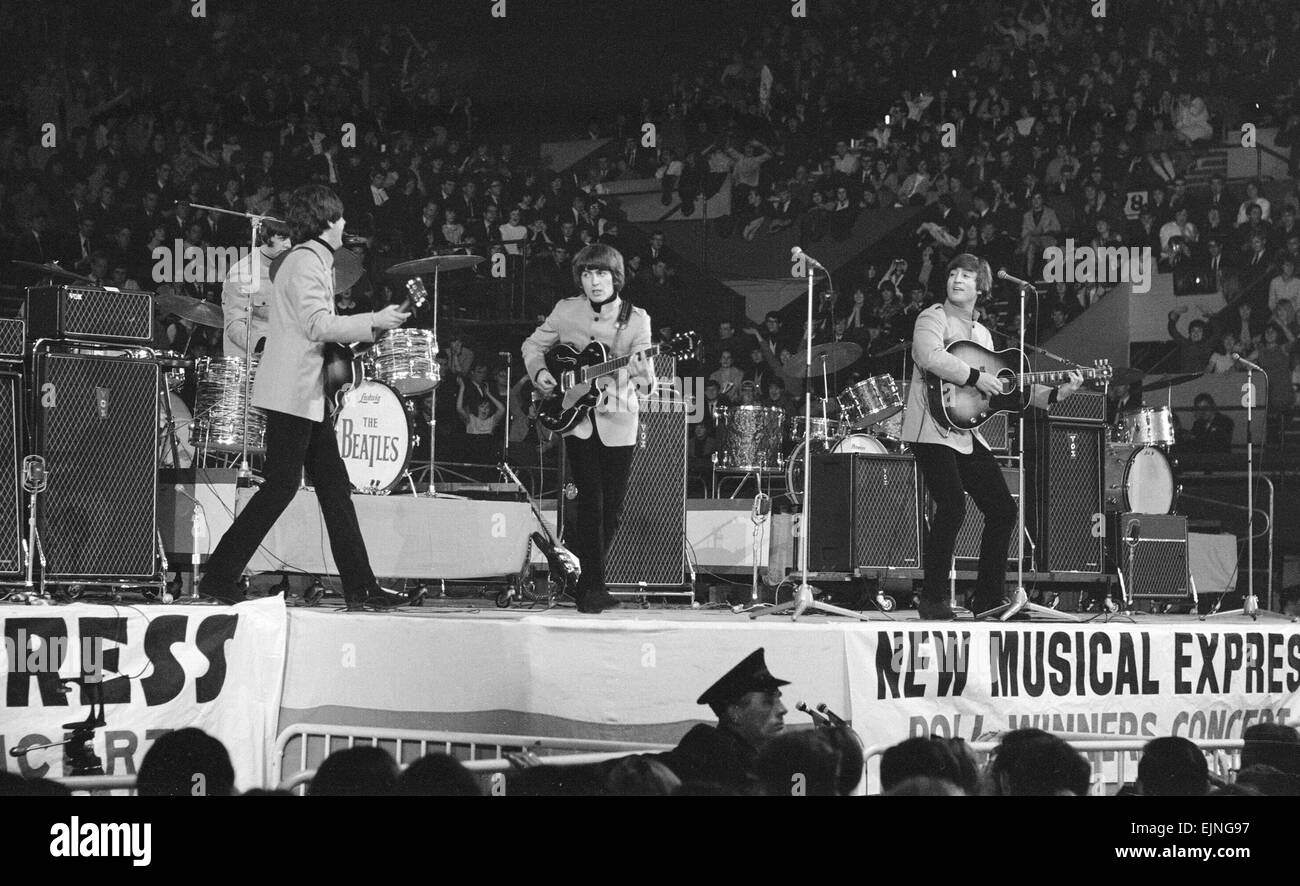New Musical Express pop concert at Empire Pool Wembley 11th April 1965. The annual IPC New Musical Express concert featured poll winners & guest artists including: The Beatles *** Local Caption *** George Harrison Paul McCartney John Lennon Stock Photo