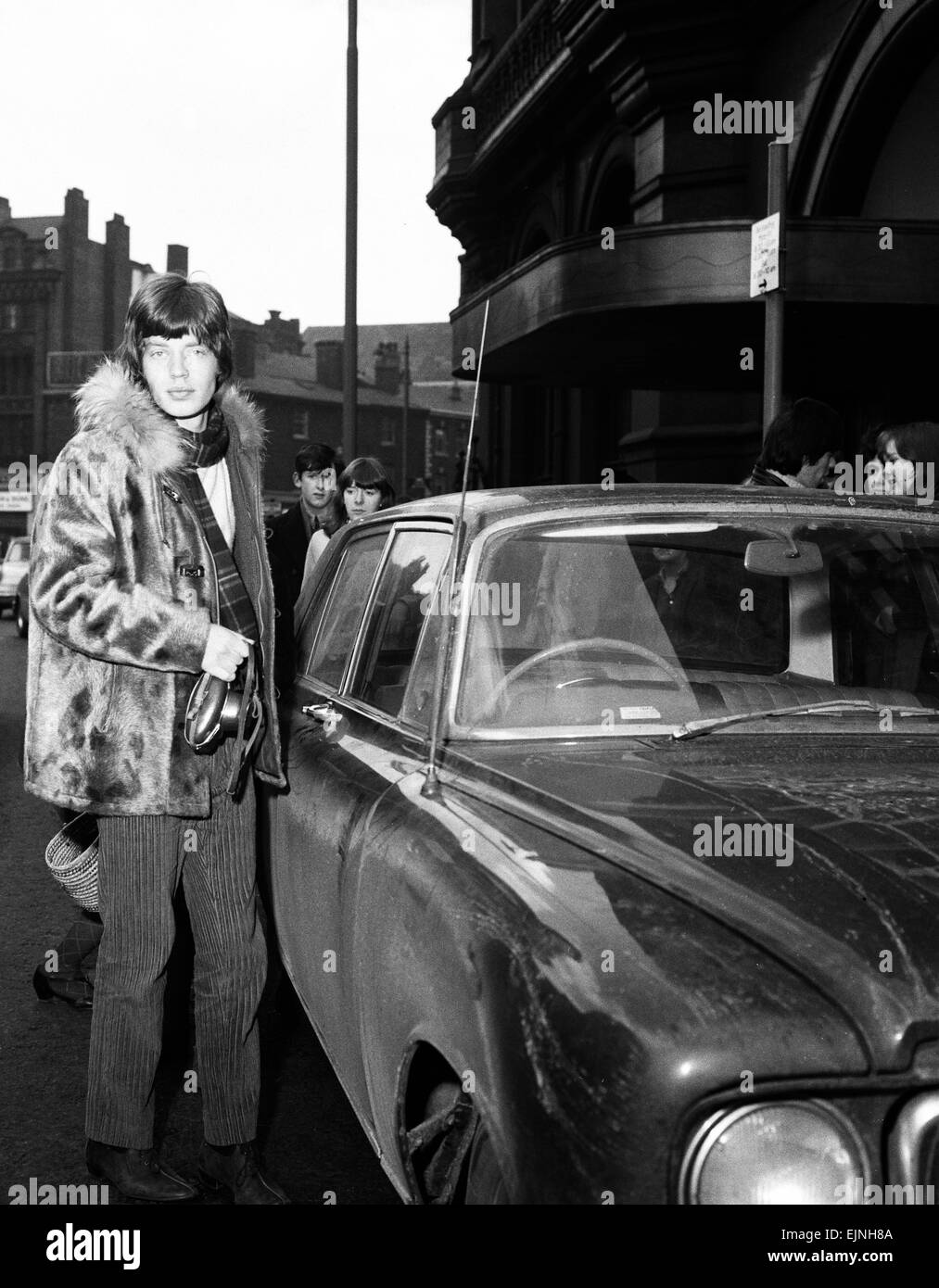 Mick Jagger of The Rolling Stones about to get into his car after(07)