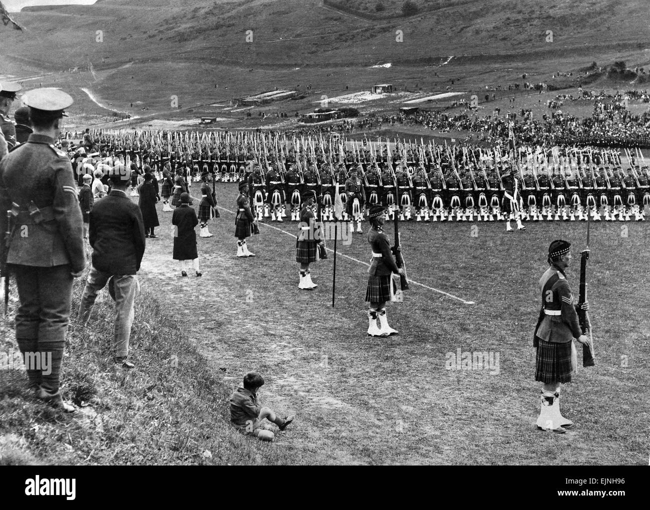 Prince of Wales inspects Seaforth Highlanders during a trooping of the colour ceremony at Dover College. 28th June 1929 Stock Photo