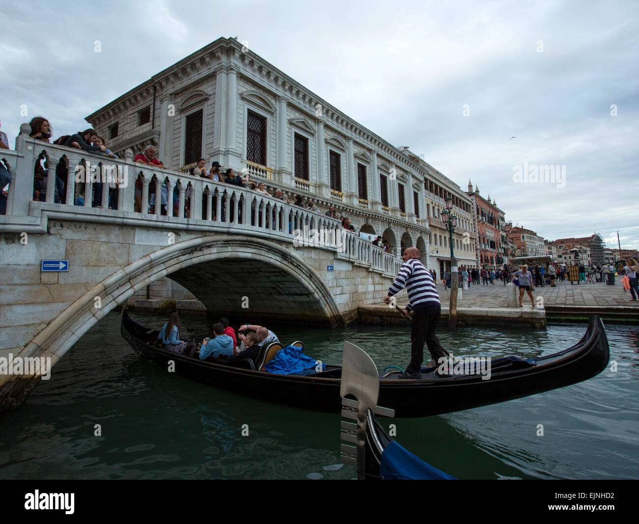 Venice, Italy gondola under pedestrian bridge lagoon Stock Photo Alamy