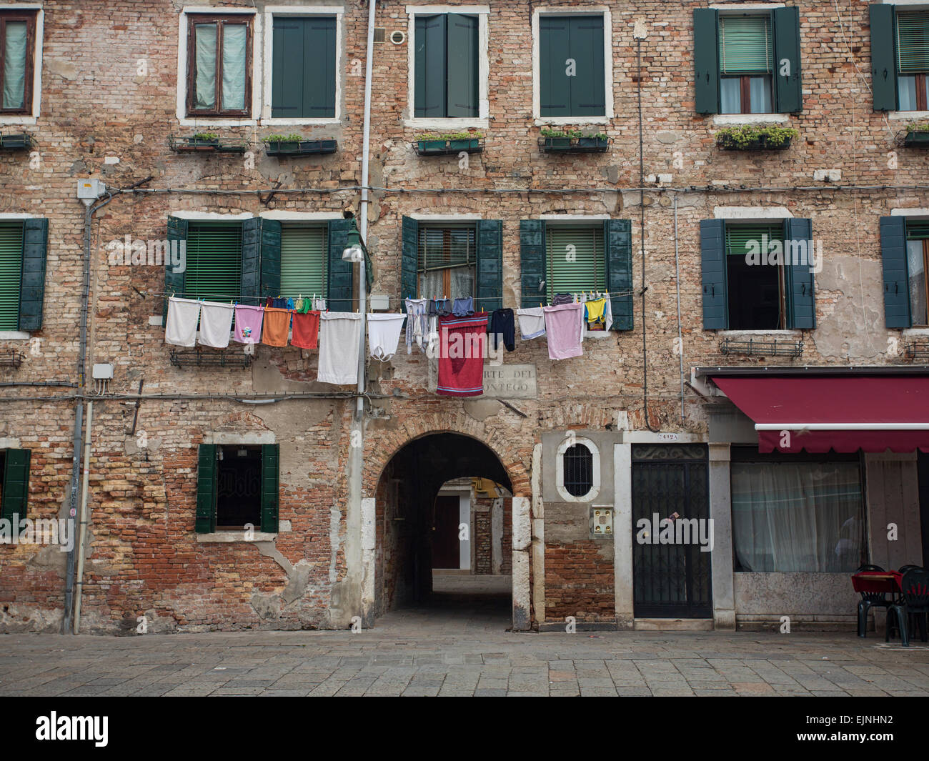 Venice, Italy laundry outside ancient apartment building Stock Photo