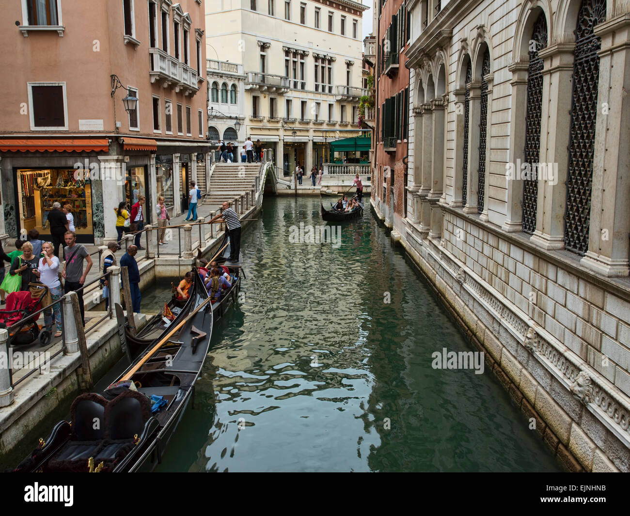 Venice Italy narrow canal tourism gondola Stock Photo - Alamy