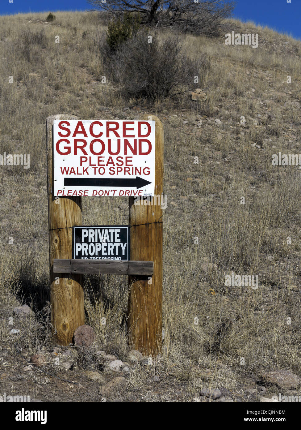 Sacred ground sign of the Ojo Caliente (Warm Springs) at the north end