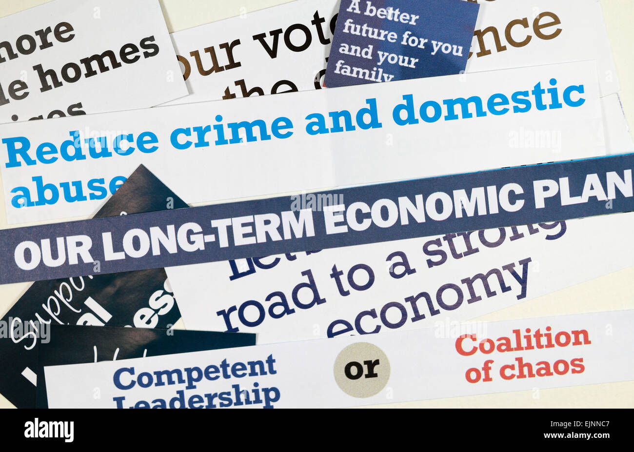 Cut out slogans from Conservative party literature received before the General Election in 2015 had begun. Stock Photo
