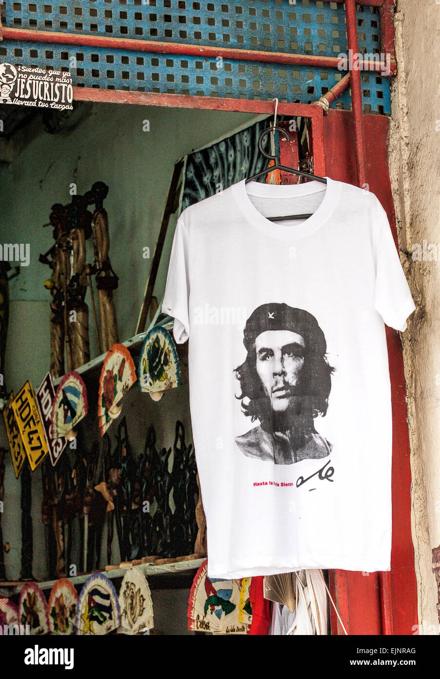 Shop front selling items to tourists such as Che Guevara T Shirts and false number plates Stock Photo