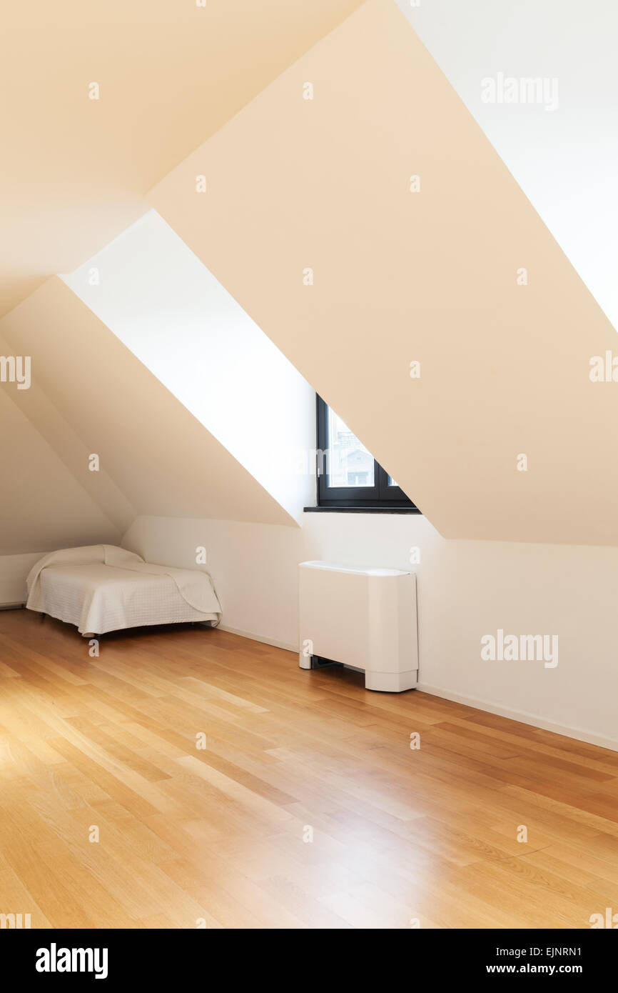 interior, beautiful loft, hardwood floor, view single bed Stock Photo