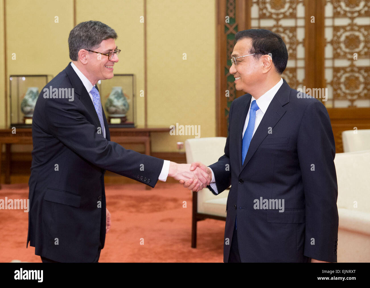 Beijing, China. 30th Mar, 2015. Chinese Premier Li Keqiang (R) meets with Treasury Secretary of the United States Jacob Lew in Beijing, capital of China, March 30, 2015. © Huang Jingwen/Xinhua/Alamy Live News Stock Photo