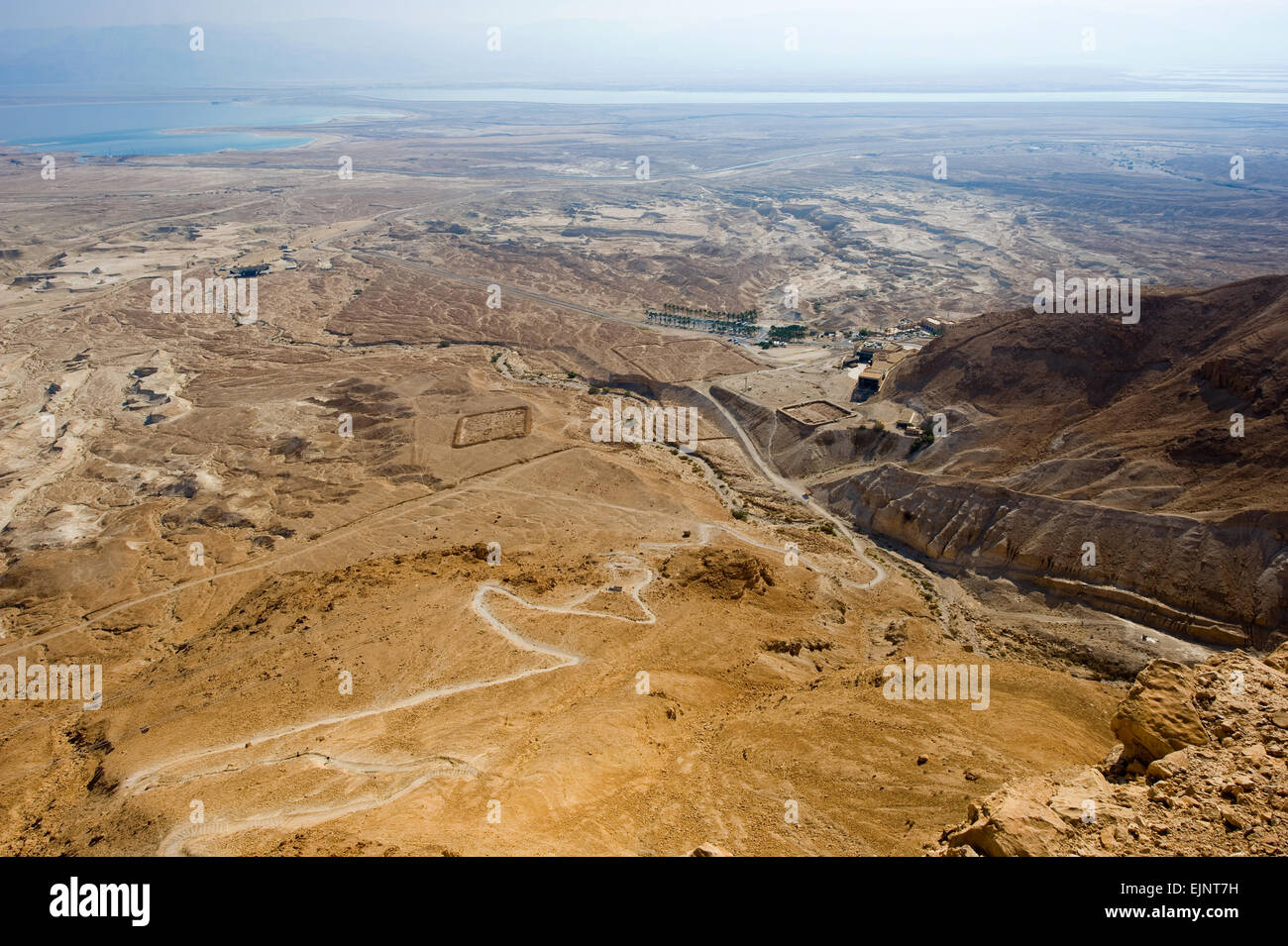View from Masada in Israel to the dead sea, with 'the nake path' where people can climbe to the top. Stock Photo