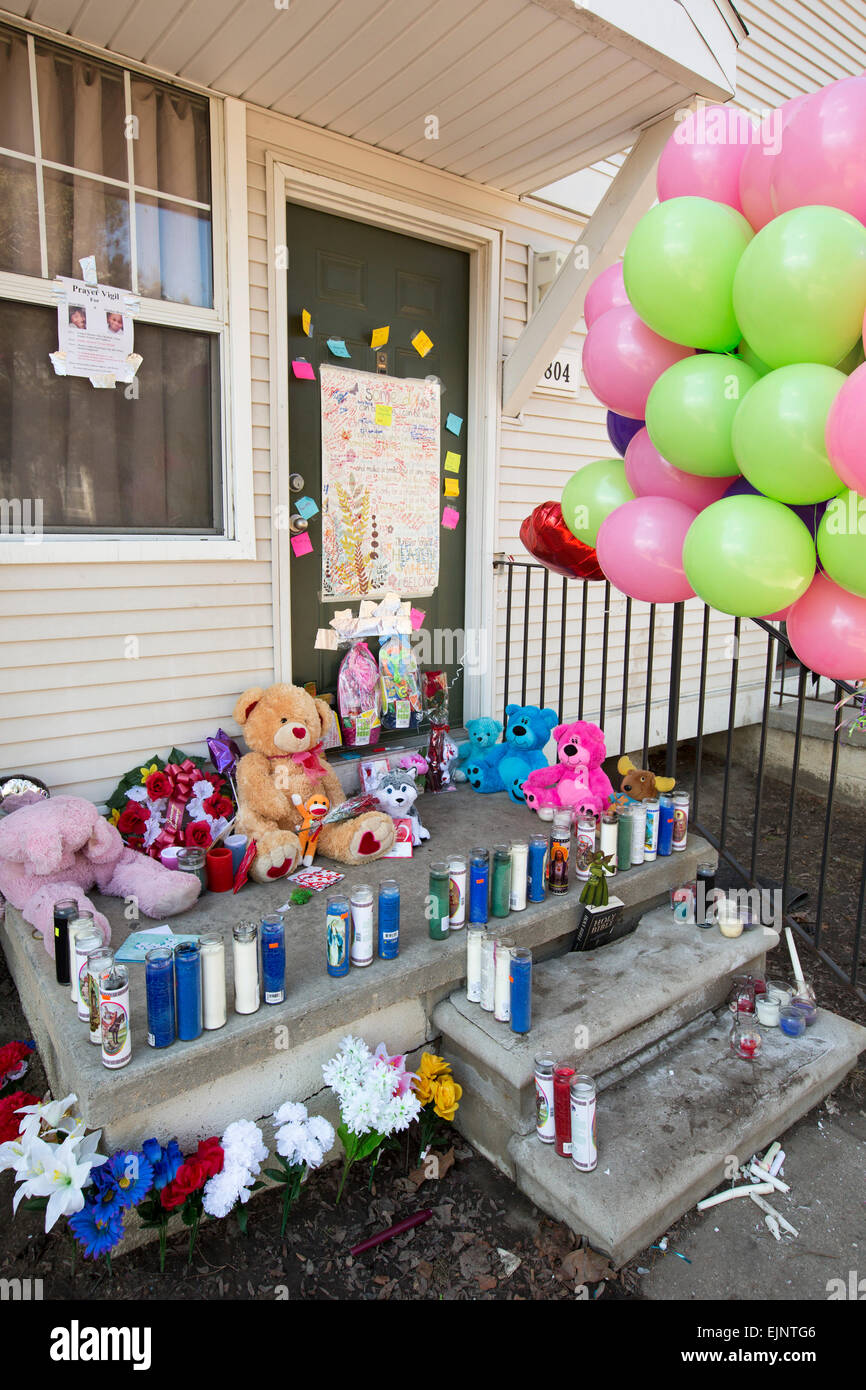 Detroit, Michigan - A memorial on the steps of a home where the bodies of two young children were found stuffed in a freezer. Stock Photo