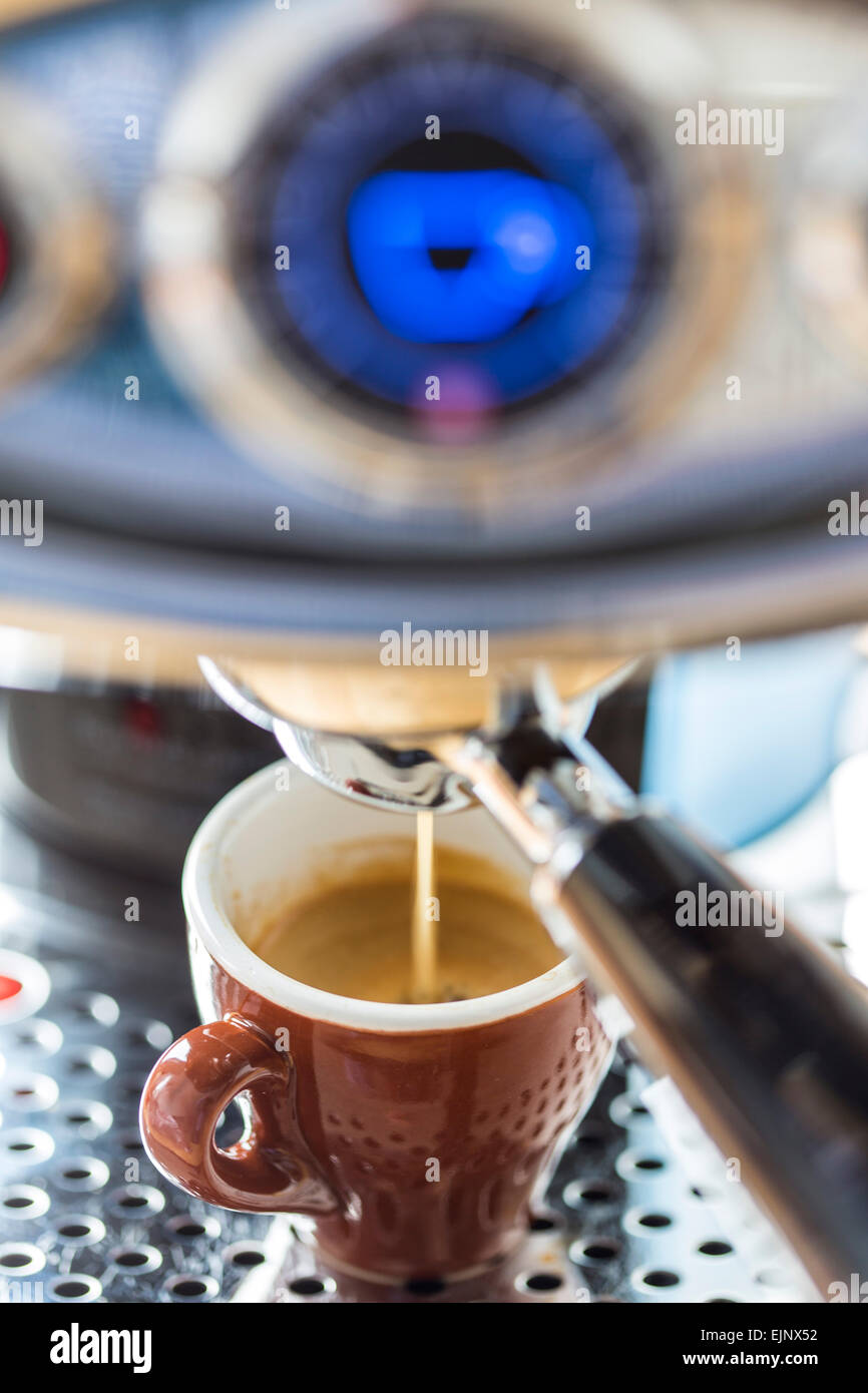 Capsule coffee machine, for the preparation of coffee, espresso, coffee