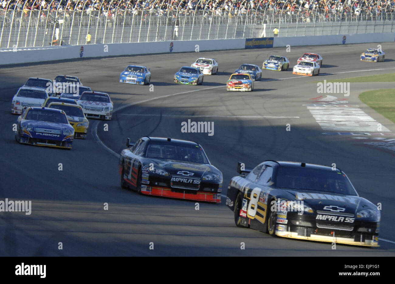 NASCAR racer Mark Martin, the driver of the U.S. Army sponsored number eight car, leads the way during the NASCAR Sprint Cup UAW Dodge 400 at Las Vegas Motor Speedway Las Vegas, Nev., March 2, 2008. U.S Air Force photo by Airman Stephanie Rubi Released Stock Photo